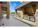 This outdoor kitchen features stainless steel appliances, a built-in grill, and a covered patio for outdoor dining and entertainment at 3740 Caesars Cir, Las Vegas, NV 89120