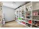Large walk-in pantry with custom shelving at 3740 Caesars Cir, Las Vegas, NV 89120