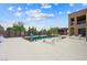 Luxurious backyard featuring a modern pool, lounge chairs, and a spacious patio area at 3740 Caesars Cir, Las Vegas, NV 89120