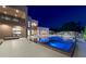 Inviting backyard features a luxurious pool with a spa, multiple lounge areas, and outdoor entertainment space at 3740 Caesars Cir, Las Vegas, NV 89120