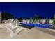 Beautiful pool and backyard, perfect for outdoor entertaining and relaxation with modern lounge furniture at 3740 Caesars Cir, Las Vegas, NV 89120