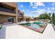 Impressive pool area with cozy lounge spots and relaxing backyard views at 3740 Caesars Cir, Las Vegas, NV 89120