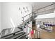An open staircase leads to a living area with high ceilings and seamless indoor/outdoor living spaces at 3740 Caesars Cir, Las Vegas, NV 89120