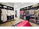 A large walk-in closet features custom shelving, an ottoman, and plenty of space for shoes and apparel at 3740 Caesars Cir, Las Vegas, NV 89120