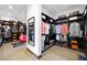 This walk-in closet boasts custom shelving for shoes and clothes, plus a cozy spot to sit and relax at 3740 Caesars Cir, Las Vegas, NV 89120