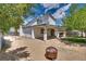 The spacious backyard features a covered patio, perfect for outdoor gatherings and entertainment at 3811 Twinkle Star Dr, Las Vegas, NV 89115