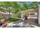 Serene backyard with covered patio, perfect for outdoor entertaining and relaxing at 3811 Twinkle Star Dr, Las Vegas, NV 89115