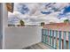 Charming balcony with wooden floorboards offering scenic views of the surrounding neighborhood at 3811 Twinkle Star Dr, Las Vegas, NV 89115