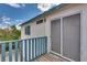 An inviting balcony offers outdoor living, a door to the home, and a view of lush foliage at 3811 Twinkle Star Dr, Las Vegas, NV 89115