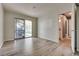 Bright bedroom featuring neutral walls and a sliding glass door leading to the backyard at 3811 Twinkle Star Dr, Las Vegas, NV 89115