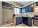 Efficient kitchen with essential appliances and ample cabinet space at 3811 Twinkle Star Dr, Las Vegas, NV 89115