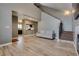 Inviting living room with wood floors, neutral paint and access to the kitchen at 3811 Twinkle Star Dr, Las Vegas, NV 89115