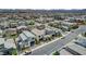 Neighborhood aerial view showcasing modern homes and desert landscaping, near the mountains at 4177 Railhead Pass Ave, Las Vegas, NV 89141