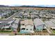 An aerial view of closely arranged homes, featuring modern architecture and some with private backyard pools at 4177 Railhead Pass Ave, Las Vegas, NV 89141
