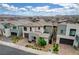 Eye-level view of a contemporary home with desert landscaping and a welcoming entrance at 4177 Railhead Pass Ave, Las Vegas, NV 89141