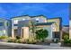 Stylish two-story residence displays a clean facade with an attached garage and fresh landscaping at 4177 Railhead Pass Ave, Las Vegas, NV 89141