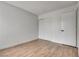 A bright bedroom featuring stylish flooring and a closet at 4205 Caliper Dr, Las Vegas, NV 89110