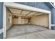 Spacious two-car garage features storage shelves and ample room for vehicles at 4205 Caliper Dr, Las Vegas, NV 89110