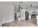 An open kitchen space with stainless steel appliances, bright lighting, and hardwood-style flooring at 4205 Caliper Dr, Las Vegas, NV 89110