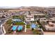 Overhead view of community showcasing the swimming pool and blue pickleball courts at 4289 Sunrise Flats St, Las Vegas, NV 89135