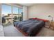 Bright bedroom with large windows, neutral walls, and comfortable furnishings at 4289 Sunrise Flats St, Las Vegas, NV 89135