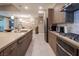 Modern kitchen with stainless steel appliances, spacious island, and stylish cabinetry at 4289 Sunrise Flats St, Las Vegas, NV 89135