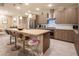 Stylish kitchen with an island, modern appliances, and a tiled backsplash at 4289 Sunrise Flats St, Las Vegas, NV 89135