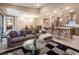Spacious living room area open to kitchen and dining, with modern decor and an airy feel at 4289 Sunrise Flats St, Las Vegas, NV 89135