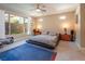 Serene bedroom with large windows, comfortable platform bed, and modern furnishings at 4289 Sunrise Flats St, Las Vegas, NV 89135