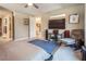 Bedroom showcasing a media center, comfortable recliner, and an open layout at 4289 Sunrise Flats St, Las Vegas, NV 89135