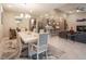 Spacious open-concept living space with dining area, kitchen, and ample natural light at 4289 Sunrise Flats St, Las Vegas, NV 89135