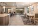 Open concept with dining area, kitchen and living area with a seamless flow and natural light at 4289 Sunrise Flats St, Las Vegas, NV 89135