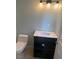 Neutral toned bathroom featuring a modern sink and vanity at 4626 Sacks Dr, Las Vegas, NV 89122
