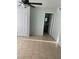 Bedroom with tile flooring and bathroom access at 4626 Sacks Dr, Las Vegas, NV 89122