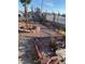 Landscaped front yard featuring decorative rock, brick accents and desert vegetation at 4626 Sacks Dr, Las Vegas, NV 89122