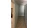 Hallway with tile floors and neutral paint at 4626 Sacks Dr, Las Vegas, NV 89122