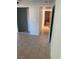 Hallway with tiled floor and doorways leading to other rooms at 4626 Sacks Dr, Las Vegas, NV 89122
