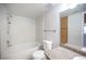 Bright bathroom with shower-tub combo and vanity with granite countertop at 5055 W Hacienda Ave # 2125, Las Vegas, NV 89118