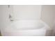 Close-up of a white bathtub with chrome faucet and tiled walls at 5055 W Hacienda Ave # 2125, Las Vegas, NV 89118