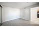 Spacious bedroom with light wood flooring and ample natural light from the doorway at 5055 W Hacienda Ave # 2125, Las Vegas, NV 89118