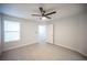 Bright bedroom with hard surface floors, a modern fan and natural light at 5055 W Hacienda Ave # 2125, Las Vegas, NV 89118