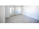 Bright bedroom featuring sliding mirror closet doors and light wood flooring at 5055 W Hacienda Ave # 2125, Las Vegas, NV 89118