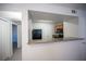 Kitchen view featuring granite countertops and stainless steel appliances, plus a view to living space at 5055 W Hacienda Ave # 2125, Las Vegas, NV 89118