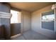 Enclosed outdoor patio area with stucco walls, window and access door at 5055 W Hacienda Ave # 2125, Las Vegas, NV 89118