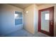 Enclosed outdoor patio space with window and door at 5055 W Hacienda Ave # 2125, Las Vegas, NV 89118