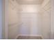 Walk-in closet with wire shelving and hard surface floors at 5055 W Hacienda Ave # 2125, Las Vegas, NV 89118