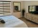 Bedroom with a large window, and modern decor and a neutral color palette at 600 N Carriage Hill Dr # 1082, Las Vegas, NV 89138