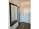 Hallway with wood-look floors, leading to various rooms at 600 N Carriage Hill Dr # 1082, Las Vegas, NV 89138