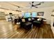 Spacious living room showcasing an open floor plan connecting to the kitchen and stylish hardwood floors at 600 N Carriage Hill Dr # 1082, Las Vegas, NV 89138