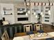 Stylish dining and living area featuring a decorative fireplace and stylish lighting fixtures at 600 N Carriage Hill Dr # 1082, Las Vegas, NV 89138